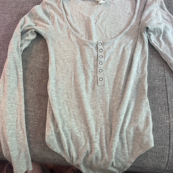 9 bodysuits, fits size large. $15 total - Picture 2 of 10